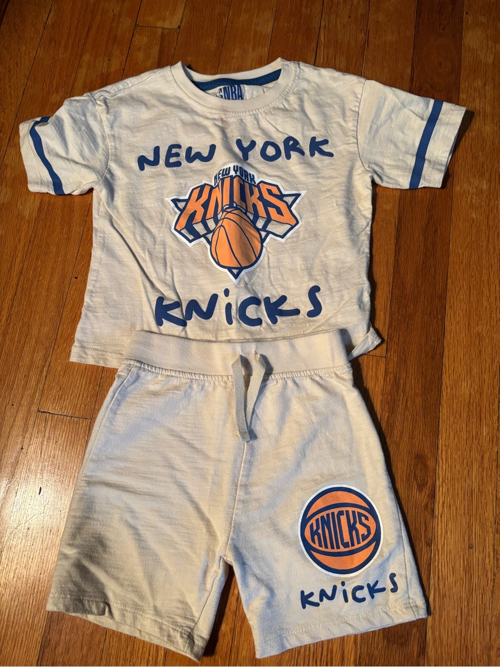 NBA White Tee with Blue Neck Trim and Blue Logo